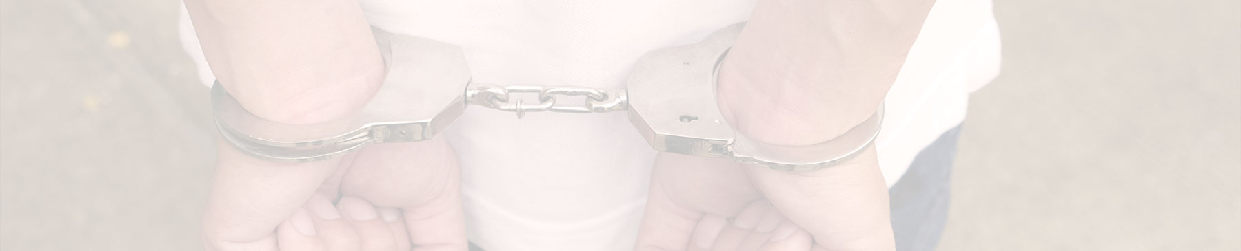 handcuffed youth