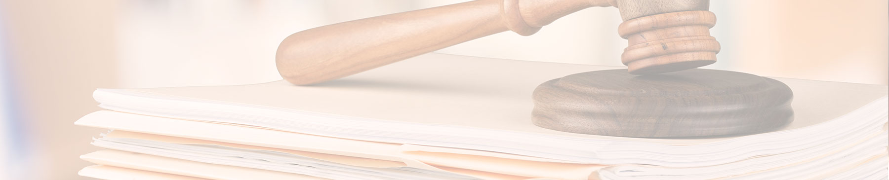 gavel on a stack of papers