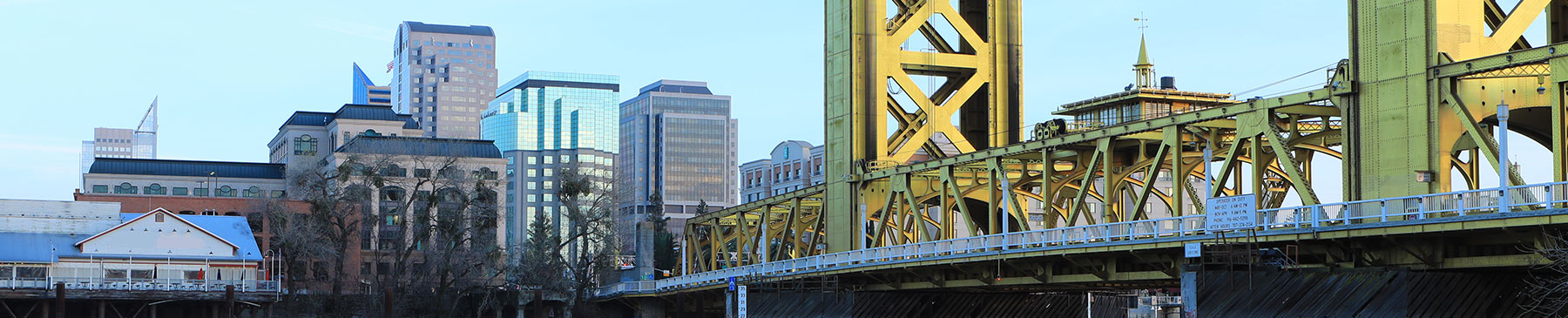 yellow towers on bridge